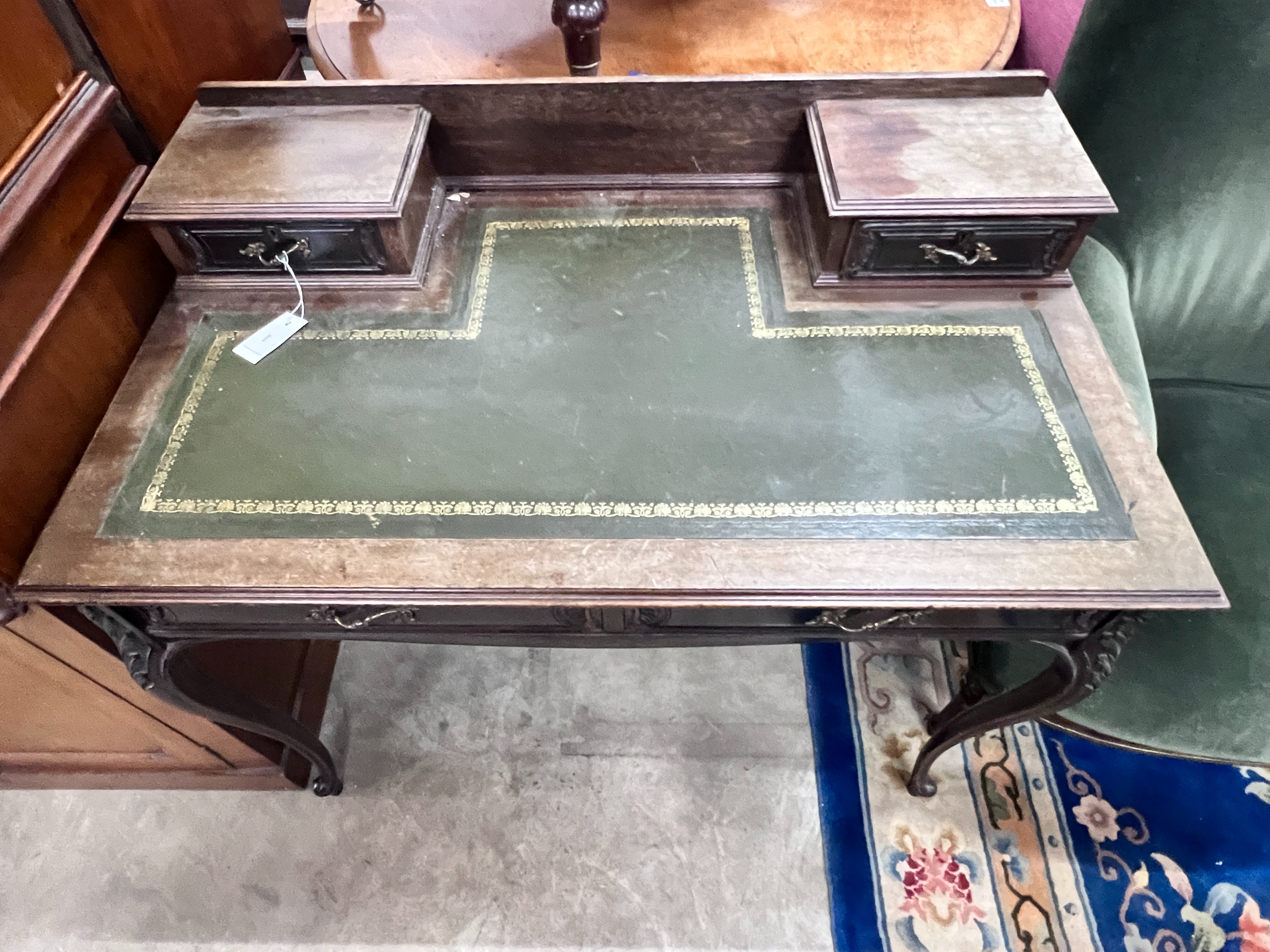A late Victorian carved mahogany writing desk, length 99cm, depth 58cm, height 88cm